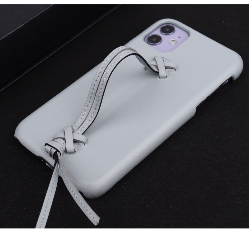 Lanueva caja de teléfono de cuero genuino de color sólido de Apple iPhone 15 Minimalista presenta una caja de transporte de correa de cuero completa y una funda de teléfono anti -otoño y colisión de 360 ​​grados de 360 ​​grados